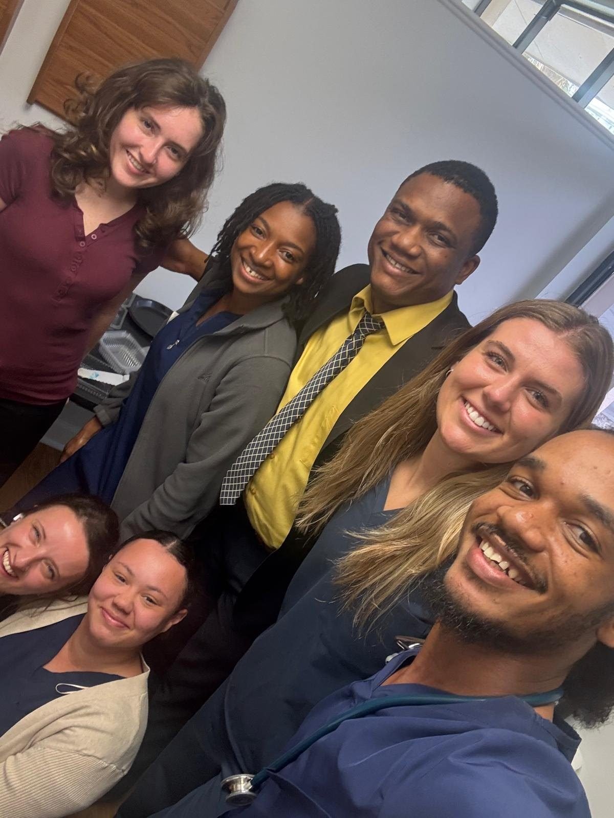 The Volusia Cardiology Associates team smiling together with Dr. Saint Croix